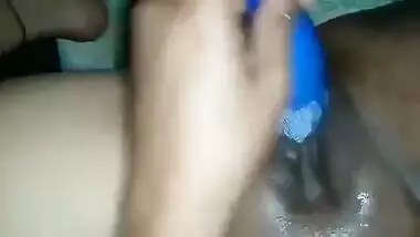 Hot Desi female shows off her smooth XXX pussy shoving a sex toy inside
