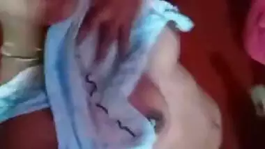 XXX selfie of young Desi woman who pulls nightgown up to show tits