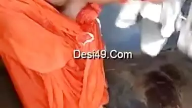 Husband films amateur porn video of the Desi wife in orange dress