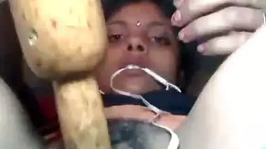Desi using chapati rod dildo to masturbate