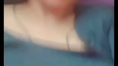 Bhabhi in glasses goes naked and fingers cunt