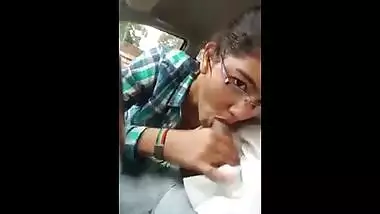 Indian porn mms of a slutty teen giving a blowjob to lover in his car