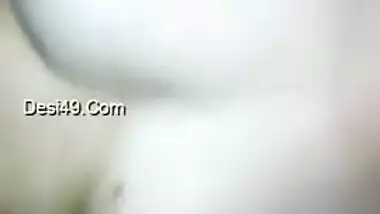 Lewd girl from India advertises her small boobies on camera in close-up