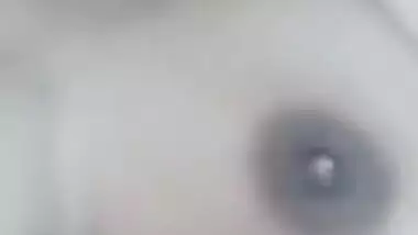 Adorable Desi bitch teases with her huge XXX tits in selfie MMS clip