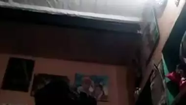 Amateur Desi slut puts off red bra and shows big XXX tits for cam