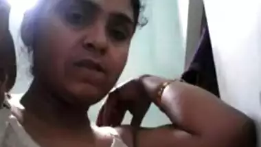 Desi female takes bra down showing off XXX boobs with dark sex nipples