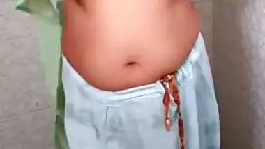 Desi woman puts on clothes but XXX hubby looks for a moment to have sex