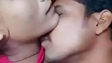 Young Desi woman is lying in bed with XXX lover kissing her on camera