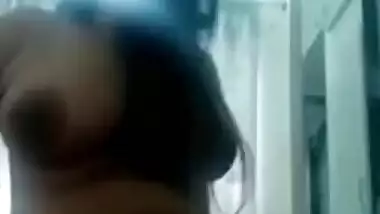 Playful XXX model boasts about beautiful natural coconuts and ass