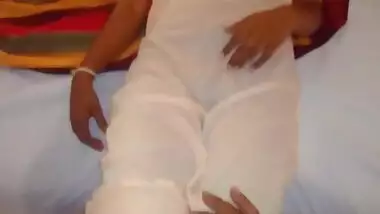 A wife in a night dress is having sex with her casual husband.