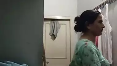 Mom changing dress caught on camera by horny son