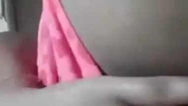 Desi cutie in pink actively XXX fingers her wet pussy on the bed